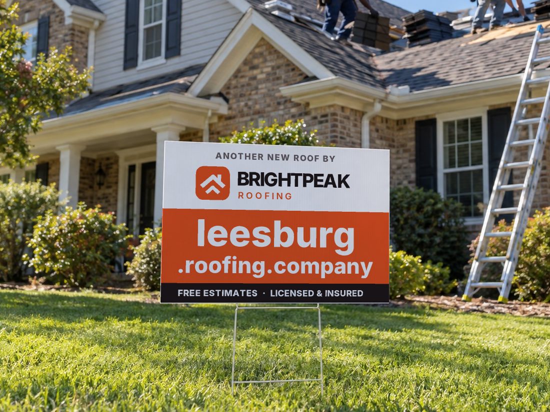 leesburg.roofing.company on a yard sign in front of a house getting a new roof